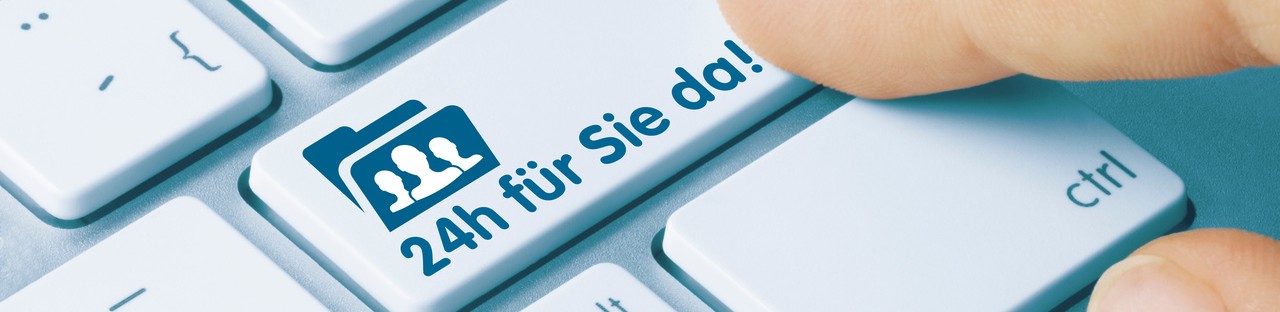 Eine Tastatur-Taste mit der Aufschrift "24h für Sie da!"